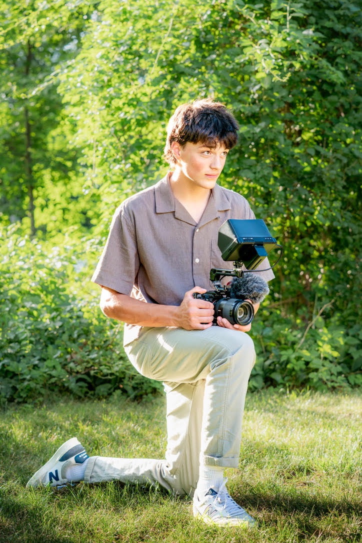 Nos — shot.by.nos photographer kneeling with a camera rig